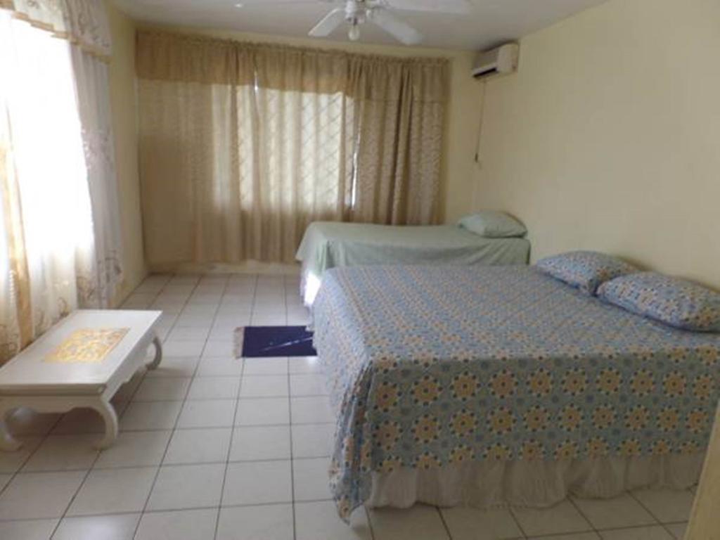 Villa Donna Inn Бухта Монтего Номер фото